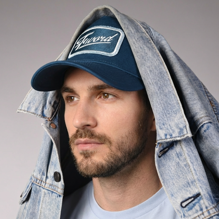 F Word Trucker Cap by Sand and Camels - model wearing the cap