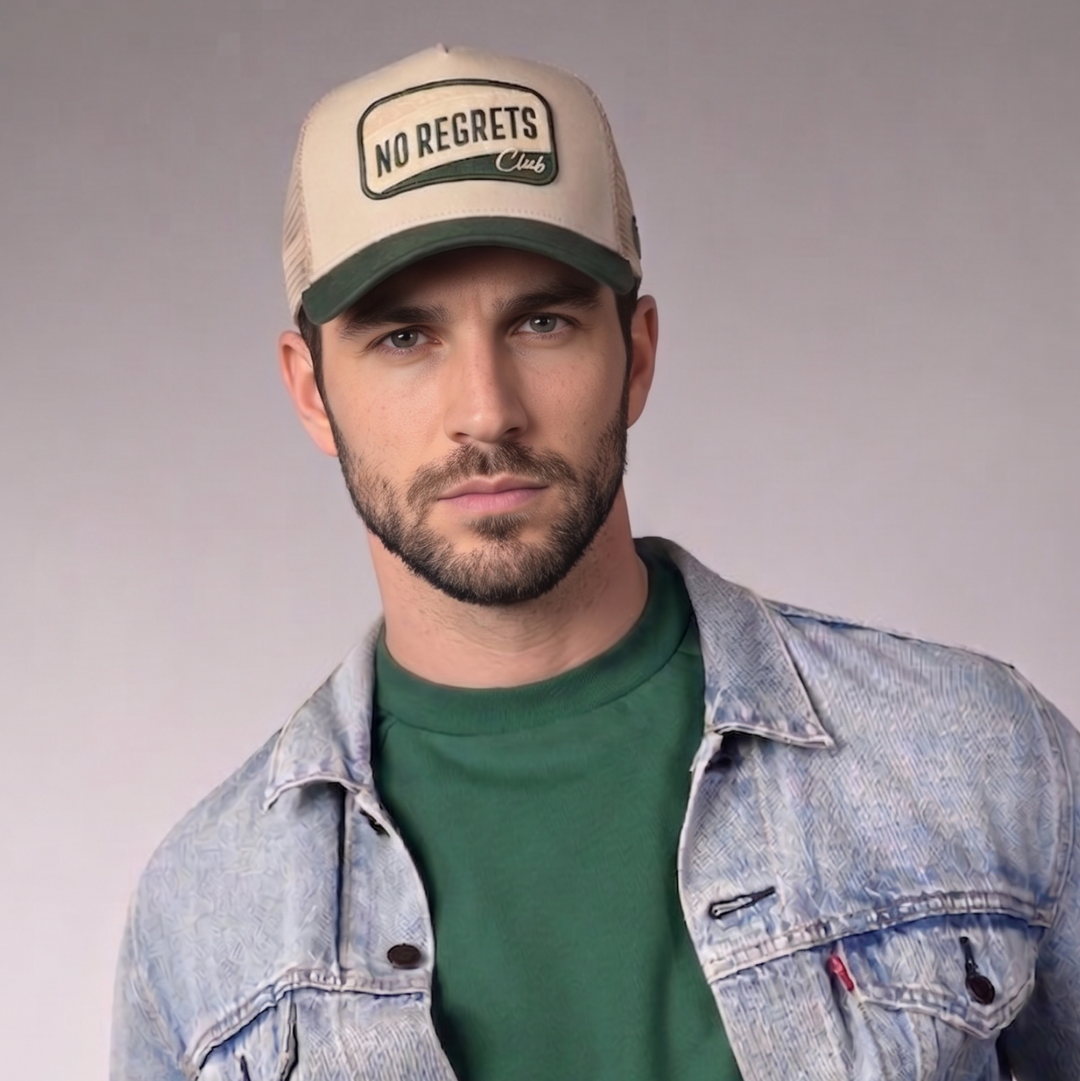 No Regrets Trucker Cap by Sand and Camels - model wearing the cap