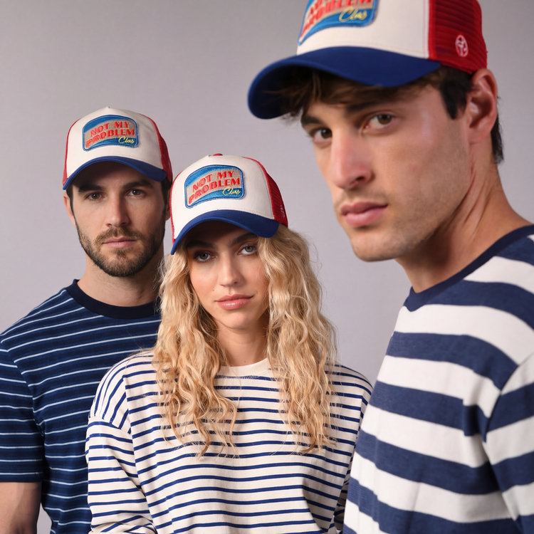 Not My Problem Trucker Cap by Sand and Camels - model wearing the cap