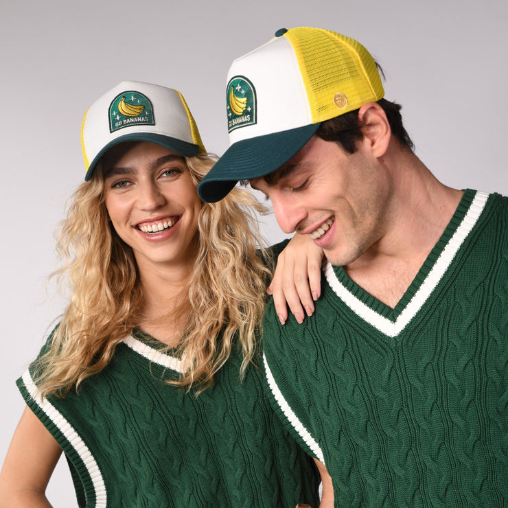 sand and camels cap, go bananans, A couple with a green sweater